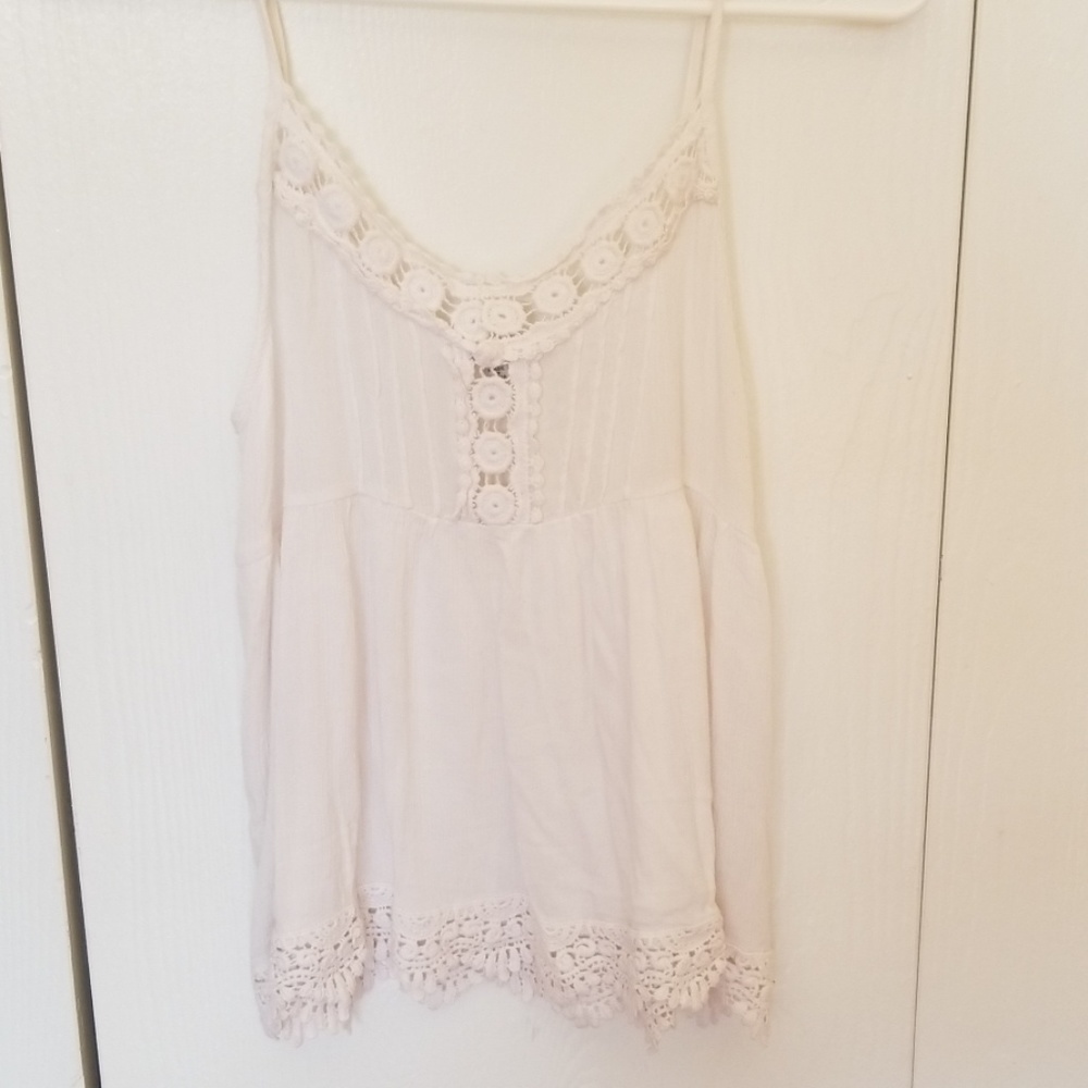 White/cream color tank with lacy features